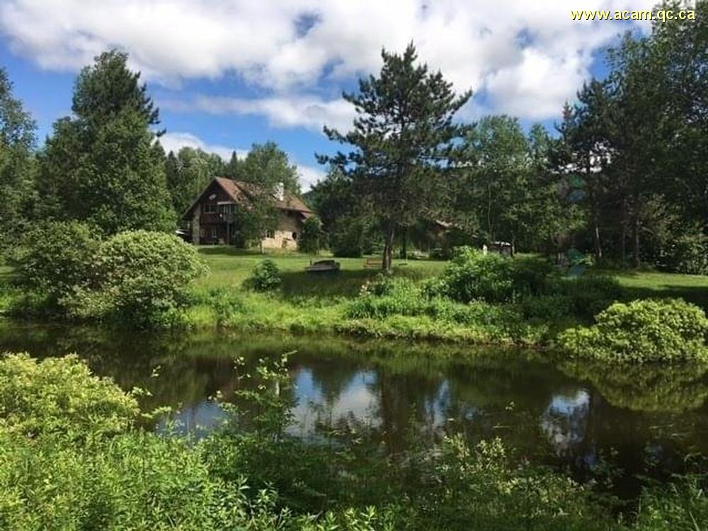 Chalet-locatif-avec-etang-priv Maison-Chalet